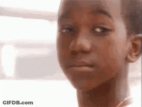 Young Boy Making Funny Face GIF