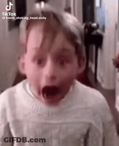 Young Boy Making Funny Face GIF