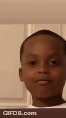 Young Boy Making Funny Face GIF