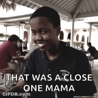 Young Boy Making Funny Face At Picnic Table GIF