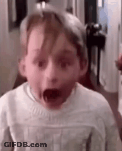 Young Boy Making Funny Face GIF