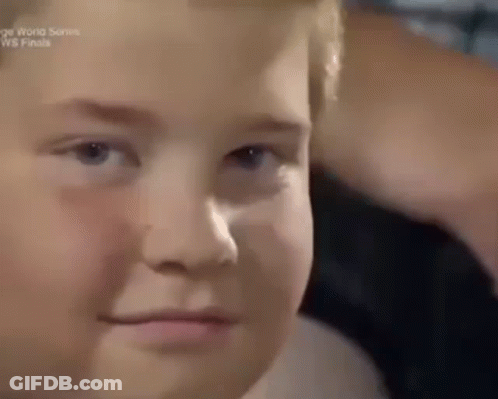 Young Boy Making Funny Face In Stadium GIF
