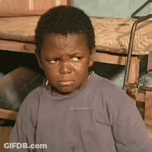 Young Boy Making Funny Face GIF