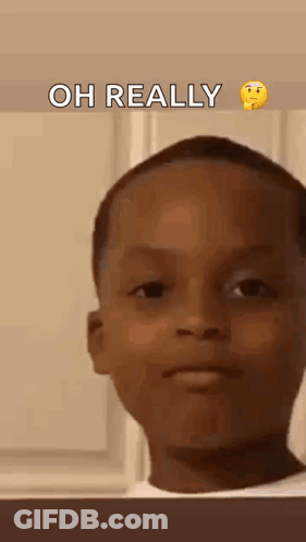 Young Boy Making Funny Face Saying Oh Really GIF