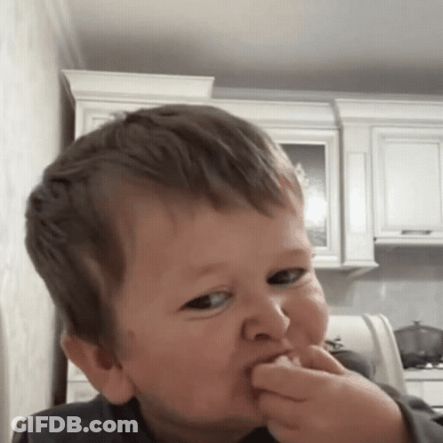 Young Boy Making Funny Face With Finger In Mouth GIF