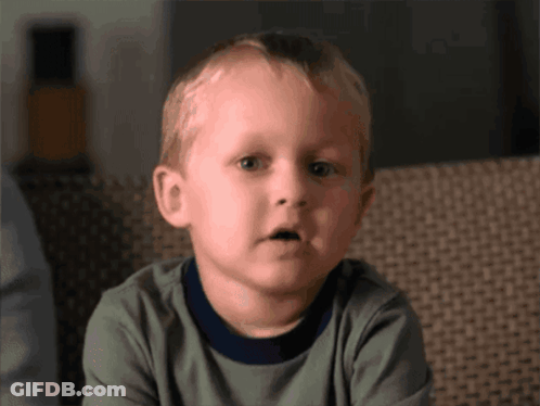 Young Boy Making Funny Face GIF