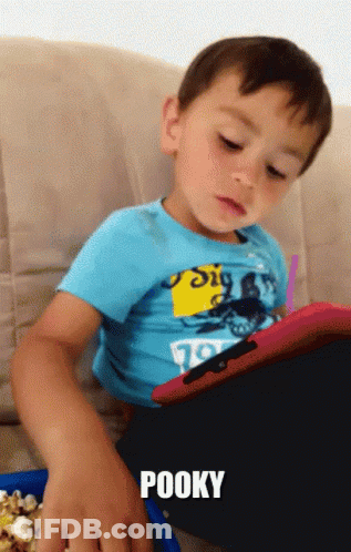 Young Boy On Couch With Pooky GIF