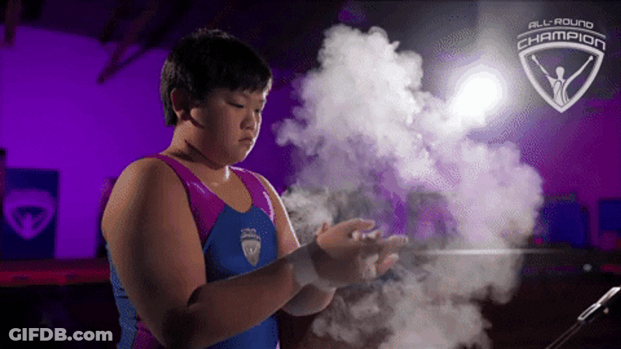 Young Boy Putting Chalk On His Hand GIF