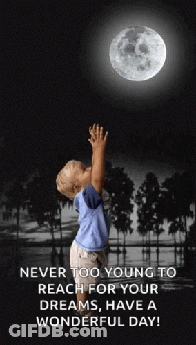 Young Boy Reaching For Moon In Black And White Photo GIF