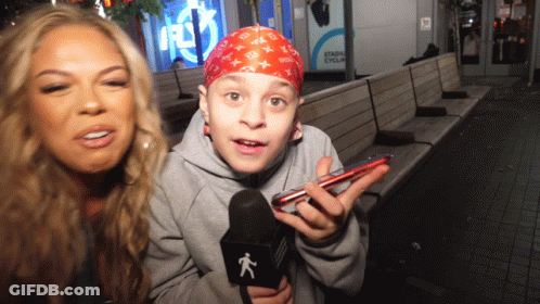 Young Boy Red Bandana Holding Microphone Stadium Cycling GIF