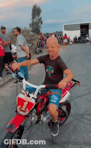 Young Boy Riding Dirt Bike Number 1 GIF