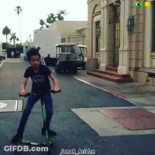 Young Boy Riding Scooter Janah Helden GIF