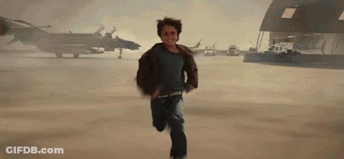 Young Boy Running On Airport Runway GIF