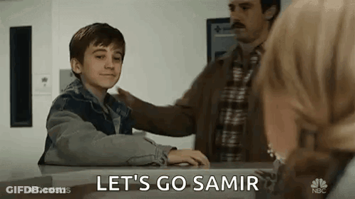 Young Boy Says Let's Go Samir At Table With Man And Woman GIF