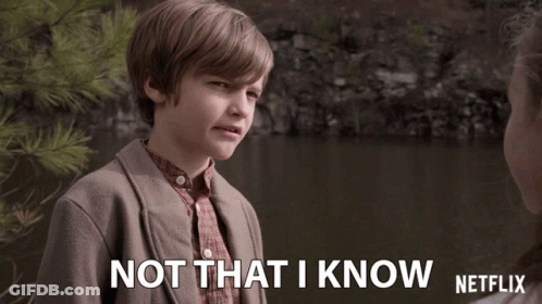 Young Boy Says Not That I Know In Front Of Lake GIF