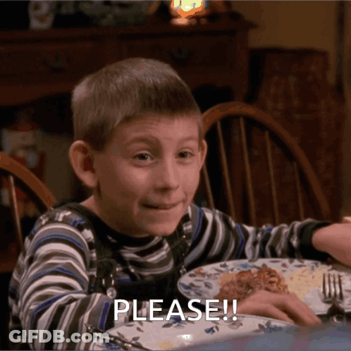 Young Boy Sitting At Table With Plate Of Food Saying Please GIF