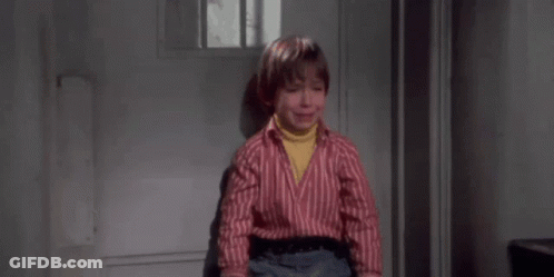 Young Boy Sitting In Chair Crying GIF