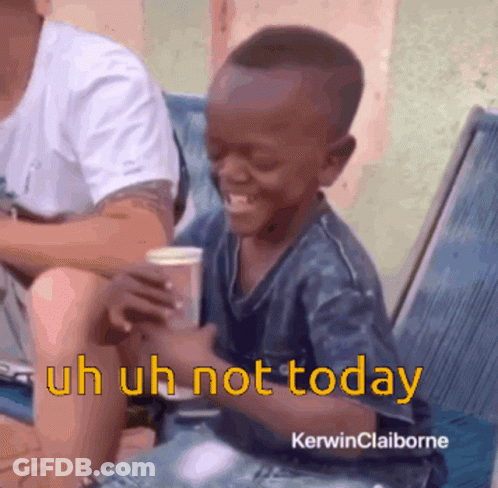 Young Boy Sitting In Chair Saying Uh Uh Not Today GIF