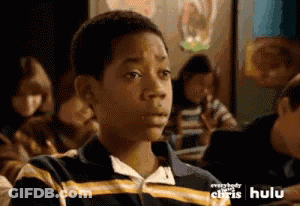 Young Boy Sitting In Classroom With Hulu Logo GIF