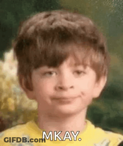 Young Boy Smiling And Making Funny Face GIF