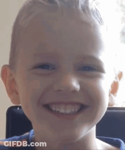 Young Boy Smiling Close Up GIF
