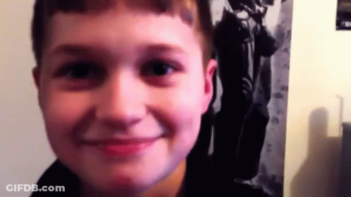 Young Boy Smiling Close Up GIF