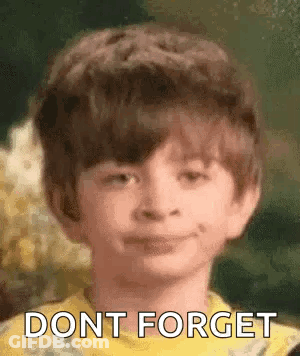 Young Boy Smiling Saying Don't Forget In Yellow Shirt GIF