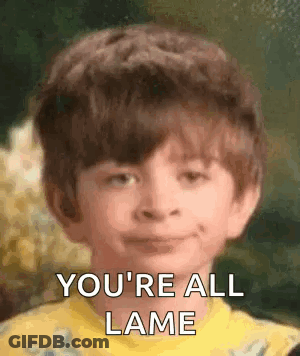 Young Boy Smiling Saying You're All Lame In Yellow Shirt GIF