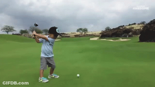 Young Boy Swings Golf Club Sponsored By Awesome GIF
