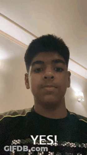Young Boy Taking Selfie Saying Yes GIF