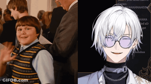 Young Boy Talking To Another Boy In Hallway GIF