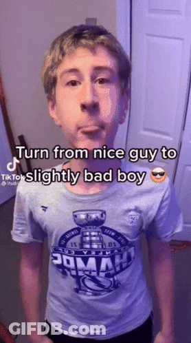 Young Boy Wearing Shirt That Says Poman GIF