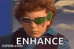 Young Boy Wearing Sunglasses With Enhance GIF