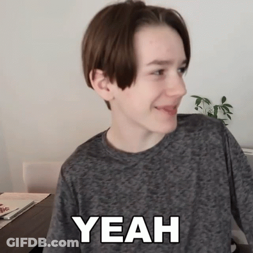Young Boy Wearing Yeah Shirt GIF