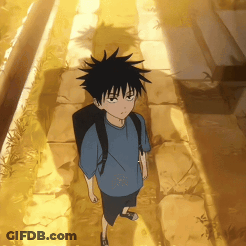 Young Boy With Backpack On Stone Walkway GIF