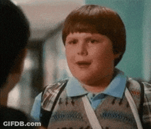 Young Boy With Backpack Talking To Another Boy GIF