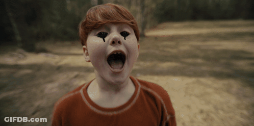 Young Boy With Black Eyes And Tears Screaming GIF