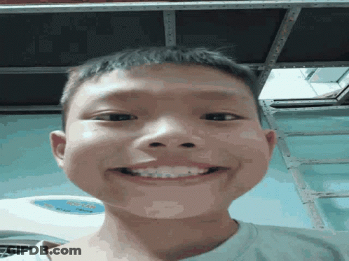 Young Boy With Braces Making Funny Face GIF