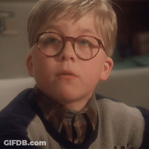 Young Boy With Glasses And Sweater With Letter A GIF