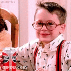 Young Boy With Glasses Holding Pepsi GIF