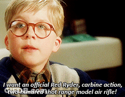 Young Boy With Glasses Says I Want An Official Red Ryder Carbine Action Two Hundred Shot Range Model Air Rifle GIF