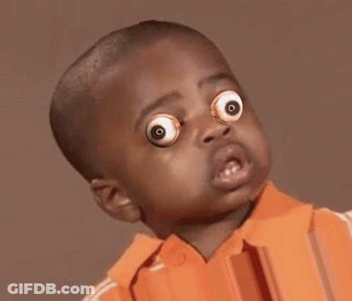 Young Boy With Googly Eyes And Orange Shirt GIF