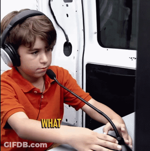 Young Boy With Headphones Holding Microphone Saying What GIF