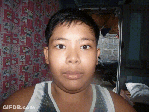 Young Boy With Hello Kitty Curtain GIF