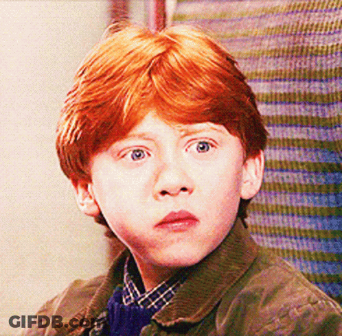 Young Boy With Red Hair Looking GIF