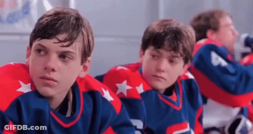 Young Boys In Hockey Jerseys In Locker Room GIF