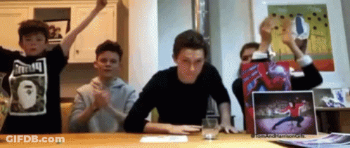 Young Boys Sitting At Kitchen Table GIF