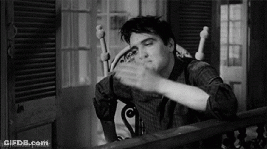 Young Elvis Presley Blowing Kisses GIF