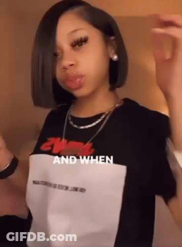 Young Girl In Black And White T-Shirt And Necklace GIF