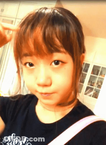 Young Girl In Black Shirt Saying Wow GIF